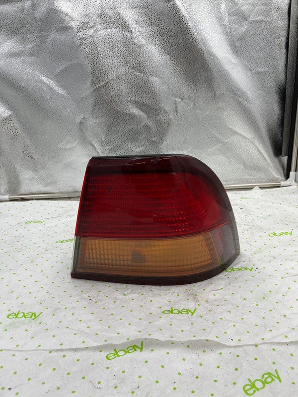 97 98 99 NISSAN MAXIMA Tail Light Assembly Right passenger side