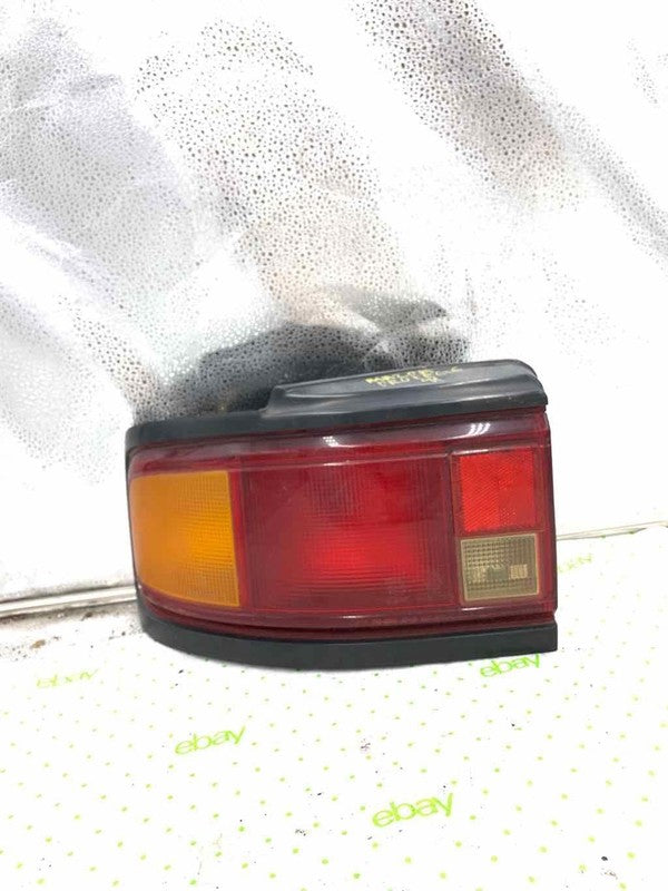 90 91 MAZDA PROTEGE Tail Light Assembly Left driver side