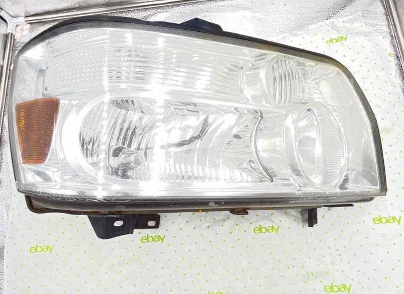 04 05 06 07 INFINITI QX56 Headlamp Assembly passenger side right