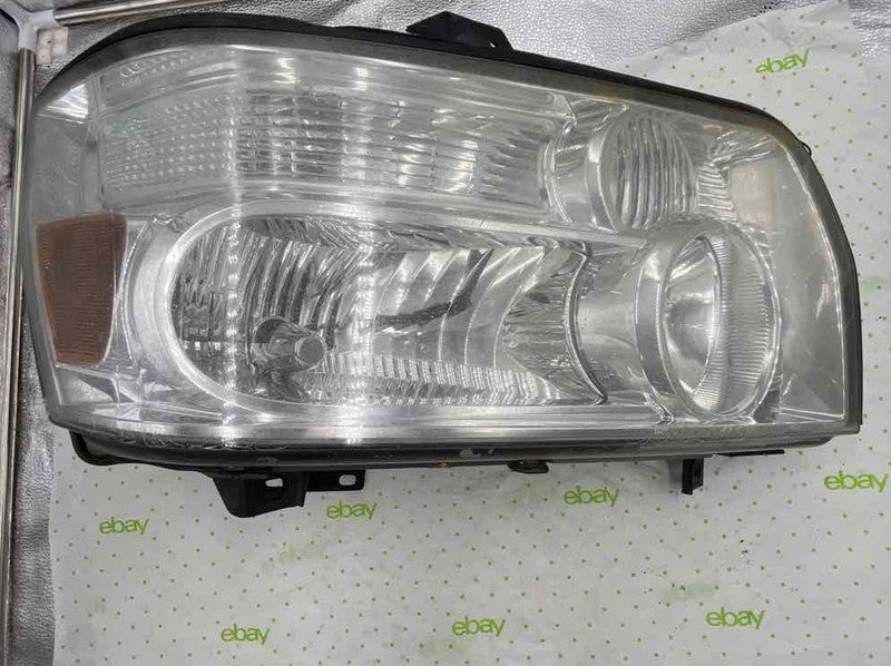 04 05 06 07 INFINITI QX56 Headlamp Assembly passenger side right