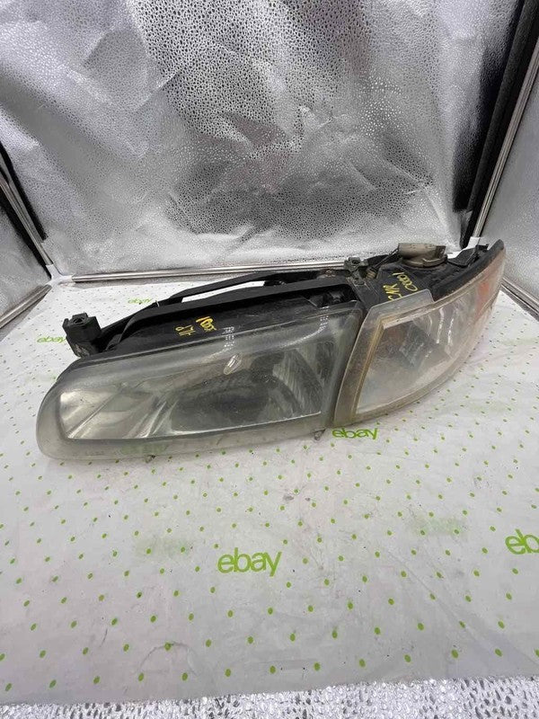 96 97 98 99 00 VOYAGER Headlamp Assembly Left driver side