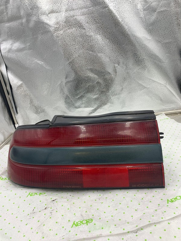 91 (DISCONTINUED) ECLIPSE Tail Light Assembly Left driver side