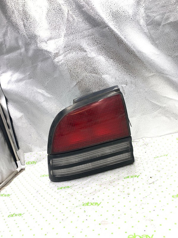 95 OLDS CUTLASS Tail Light Assembly Left driver side