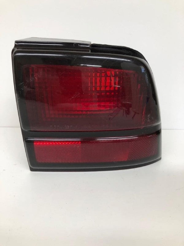 1991-1994 Chevy Cavalier Left Driver Quarter Panel Mounted Tail Light