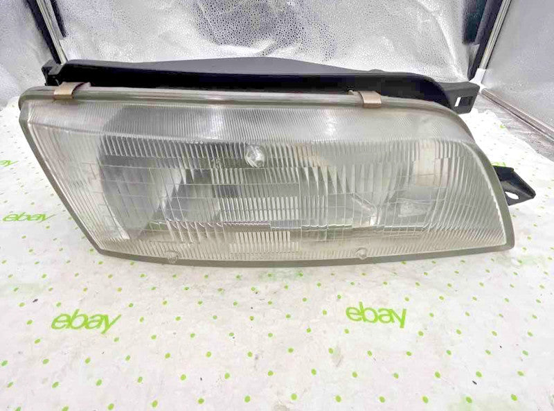 95 96 99 NISSAN MAXIMA Headlamp Assembly Right passenger side
