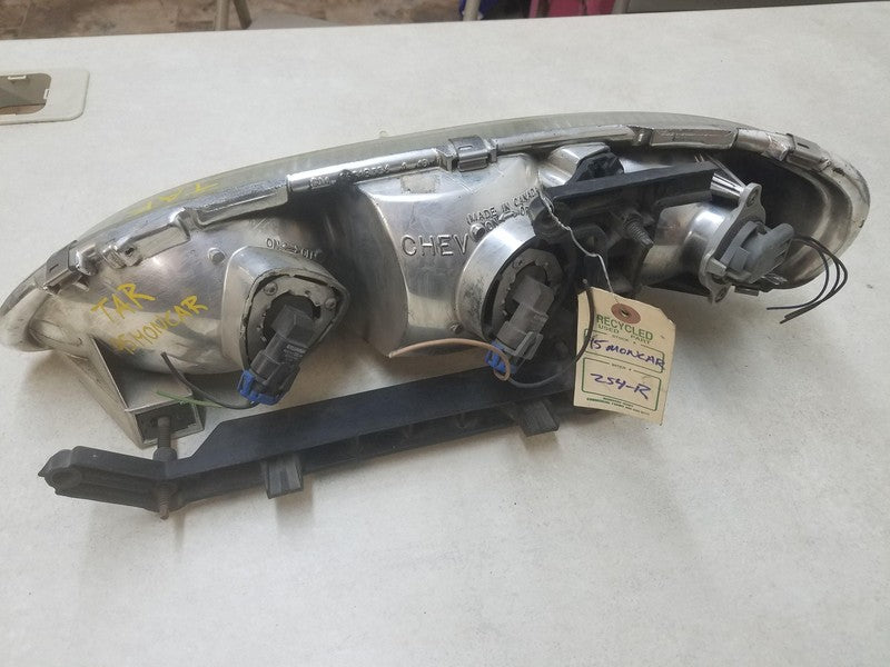 95 96 97 98 99 CHEVY MONTE CARLO Headlamp Assembly Right passenger sid