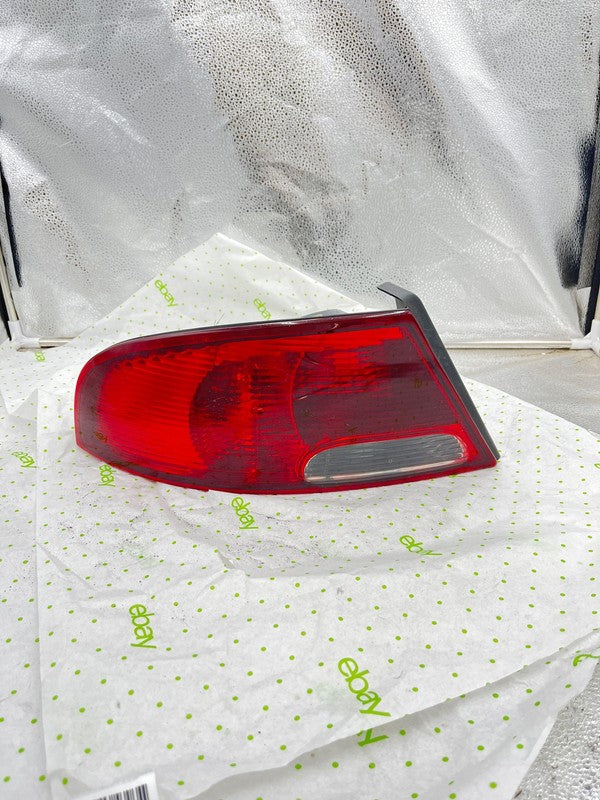01 02 03 04 05 06 DODGE STRATUS Tail Light Assembly Left driver side