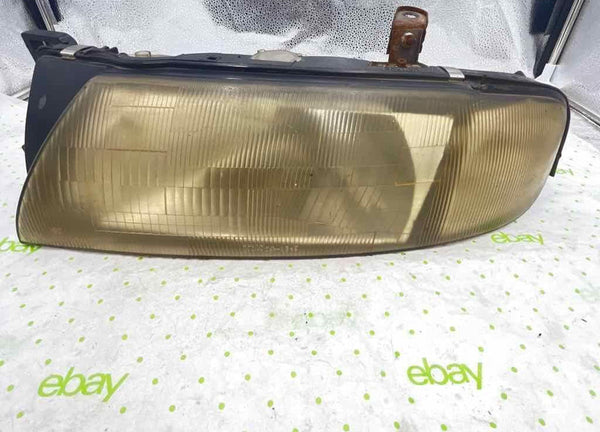 93 94 95 96 97 NISSAN ALTIMA Headlamp Assembly Left driver side