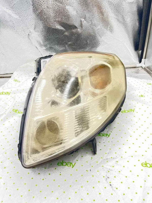 04 05 06 NISSAN MAXIMA Headlamp Assembly Right passenger side