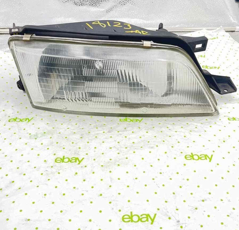 95 96 99 NISSAN MAXIMA Headlamp Assembly Right passenger side
