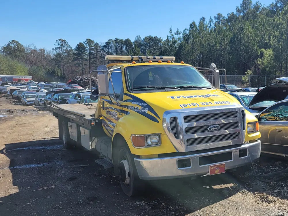 Our tow truck in the yard
